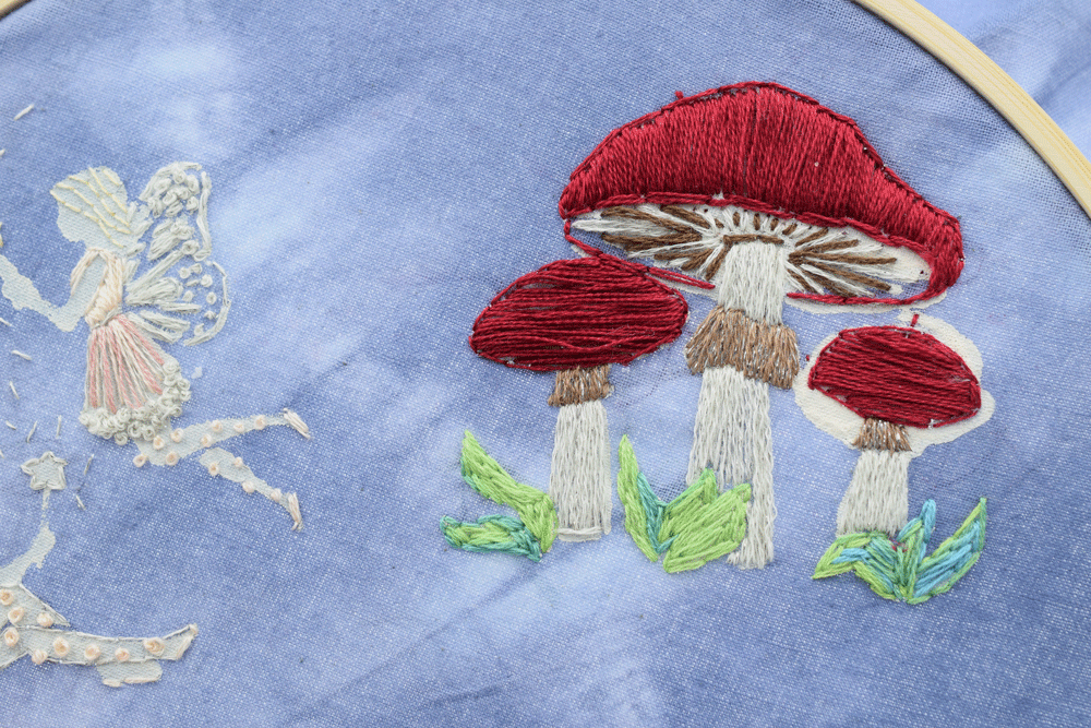 I finished the mushrooms by adding SATIN STITCH to complete the stems.