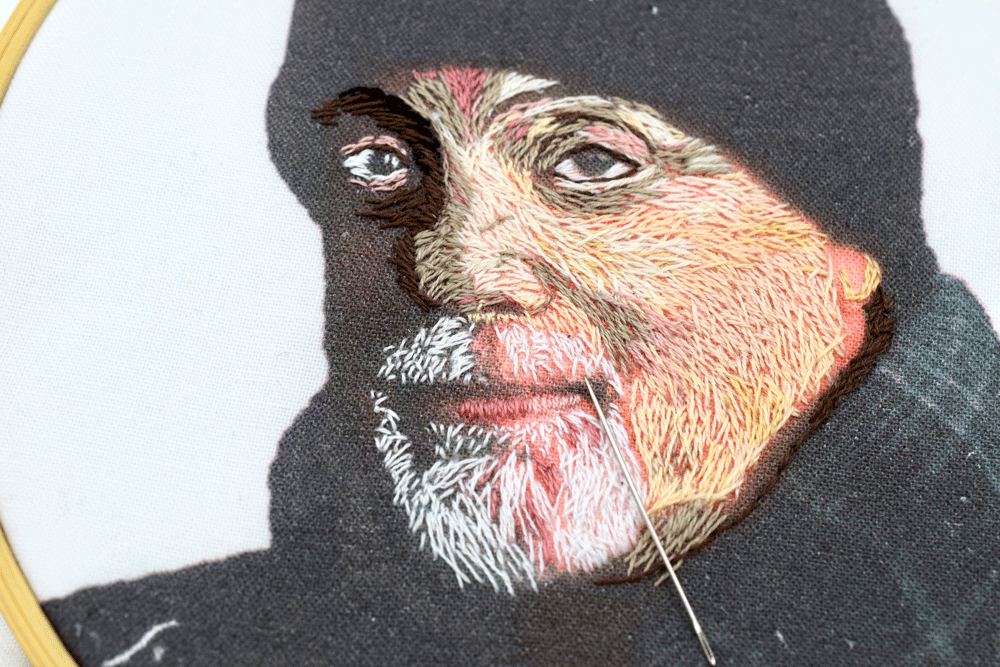 I was also worried about those eyes. There was not a single color in my thread palette that matched the specific blue green in his eyes so I left those for later and just filled in the whites.