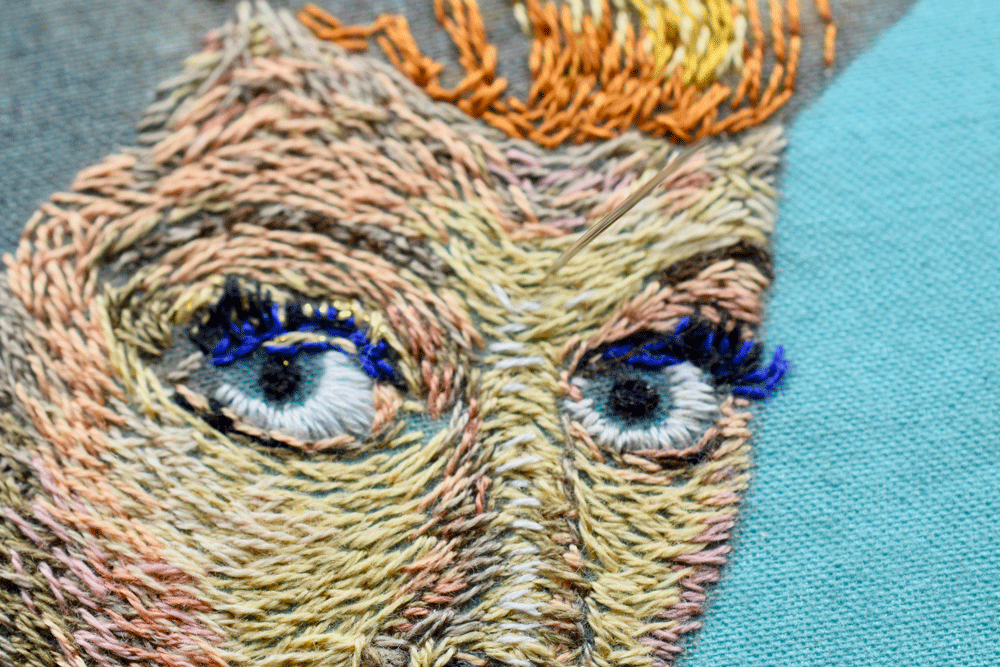 Always odd to see a needle coming up through the face, especially the eyes, as the portrait becomes more life-like.