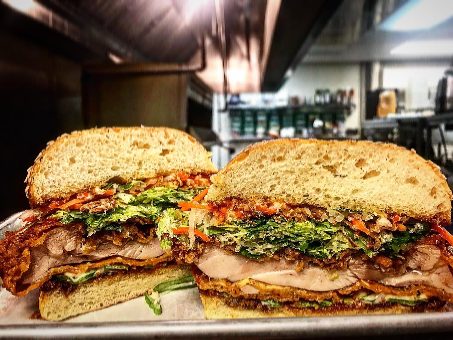 COMING SOON!! Our new Vietnamese style fried chicken sandwich. 48 hour brined chicken thigh, double fried and topped with house made garlic aioli, chili sauce, umami vinaigrette, herb salad, pickled vegetables, fresh jalape&ntilde;o all on a perfectl