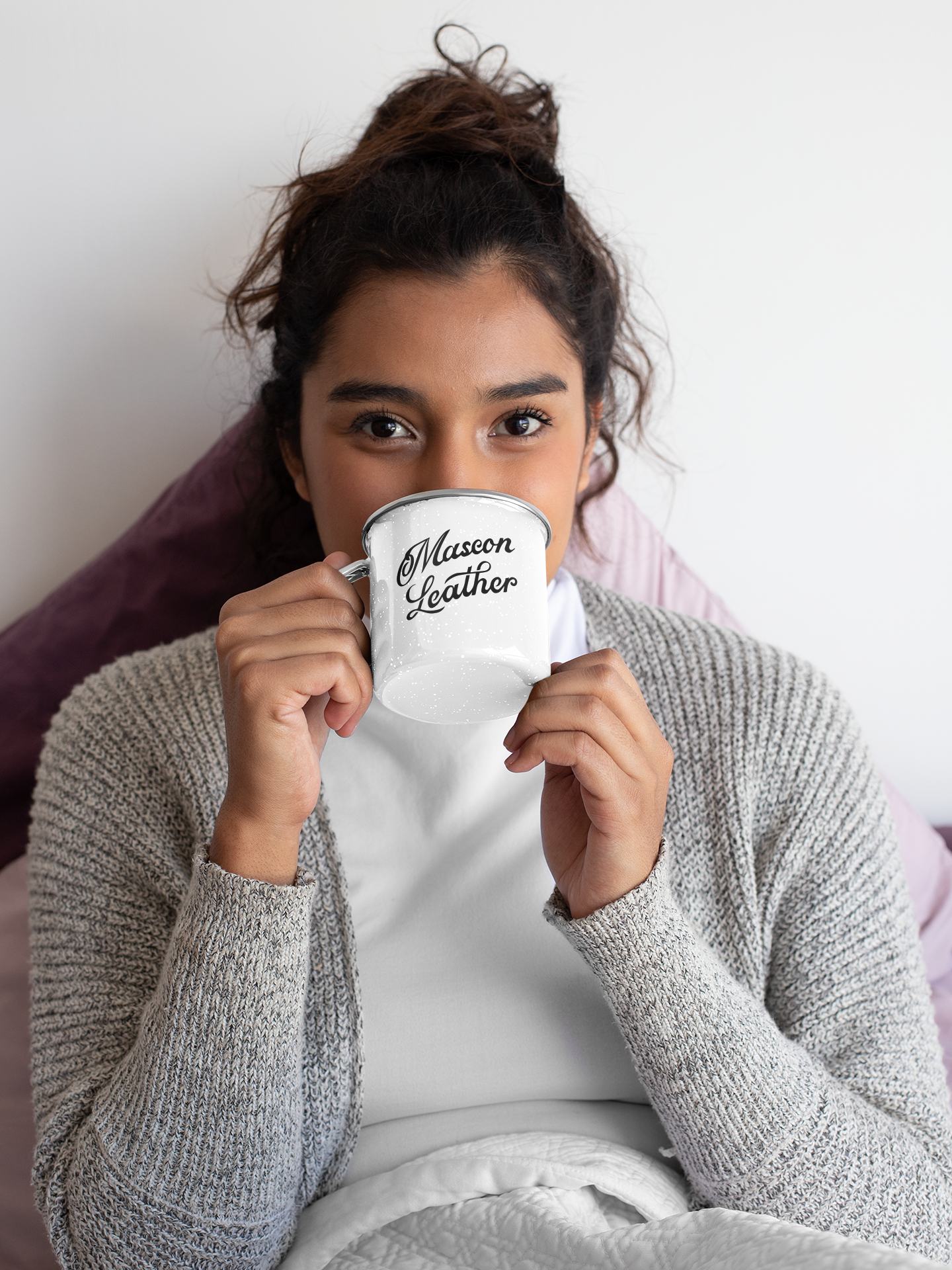 mockup-of-a-woman-in-bed-drinking-from-a-silver-rim-mug-30833.png