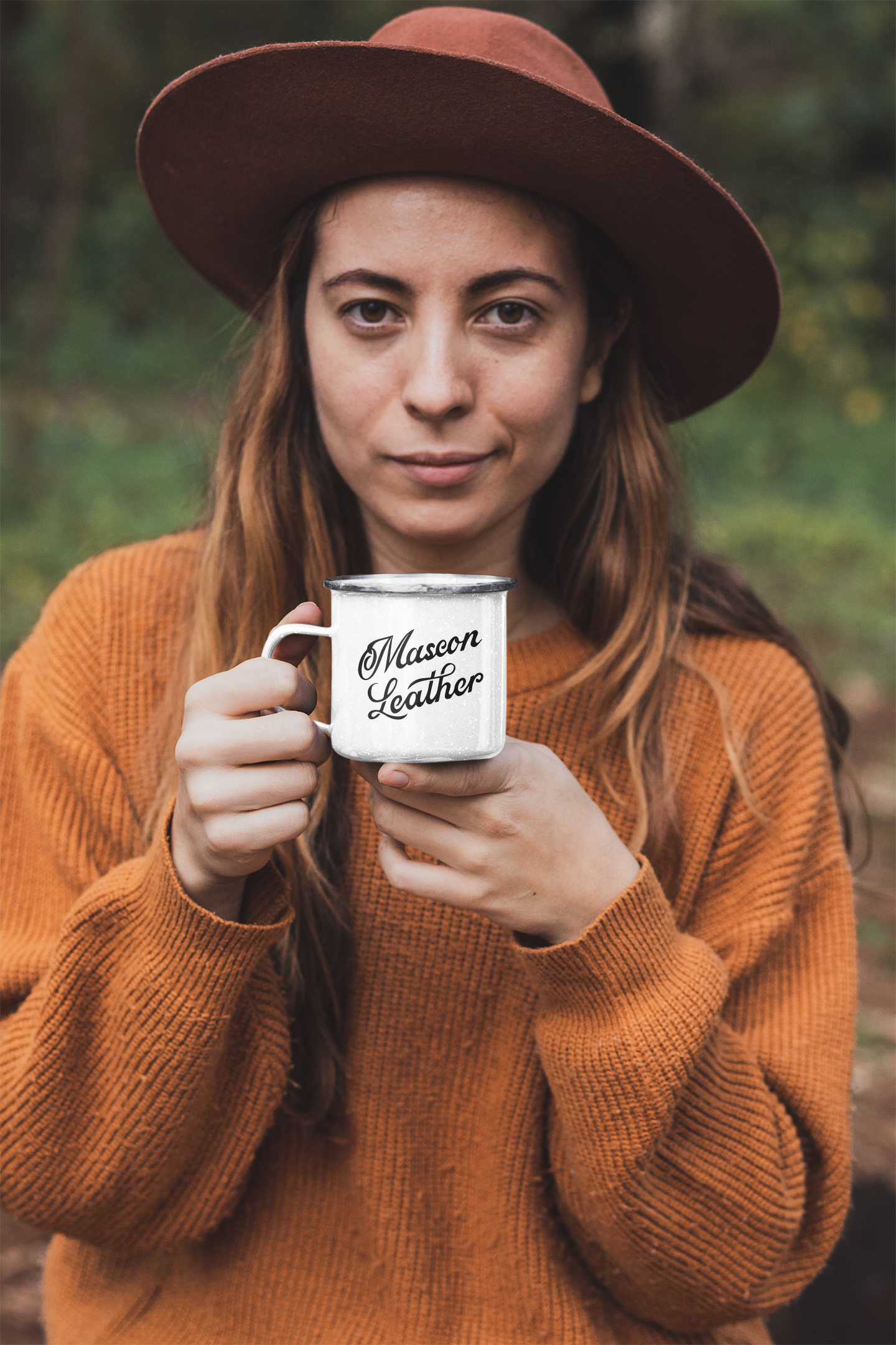 mockup-of-a-woman-in-nature-holding-a-12-oz-enamel-mug-30465a.png