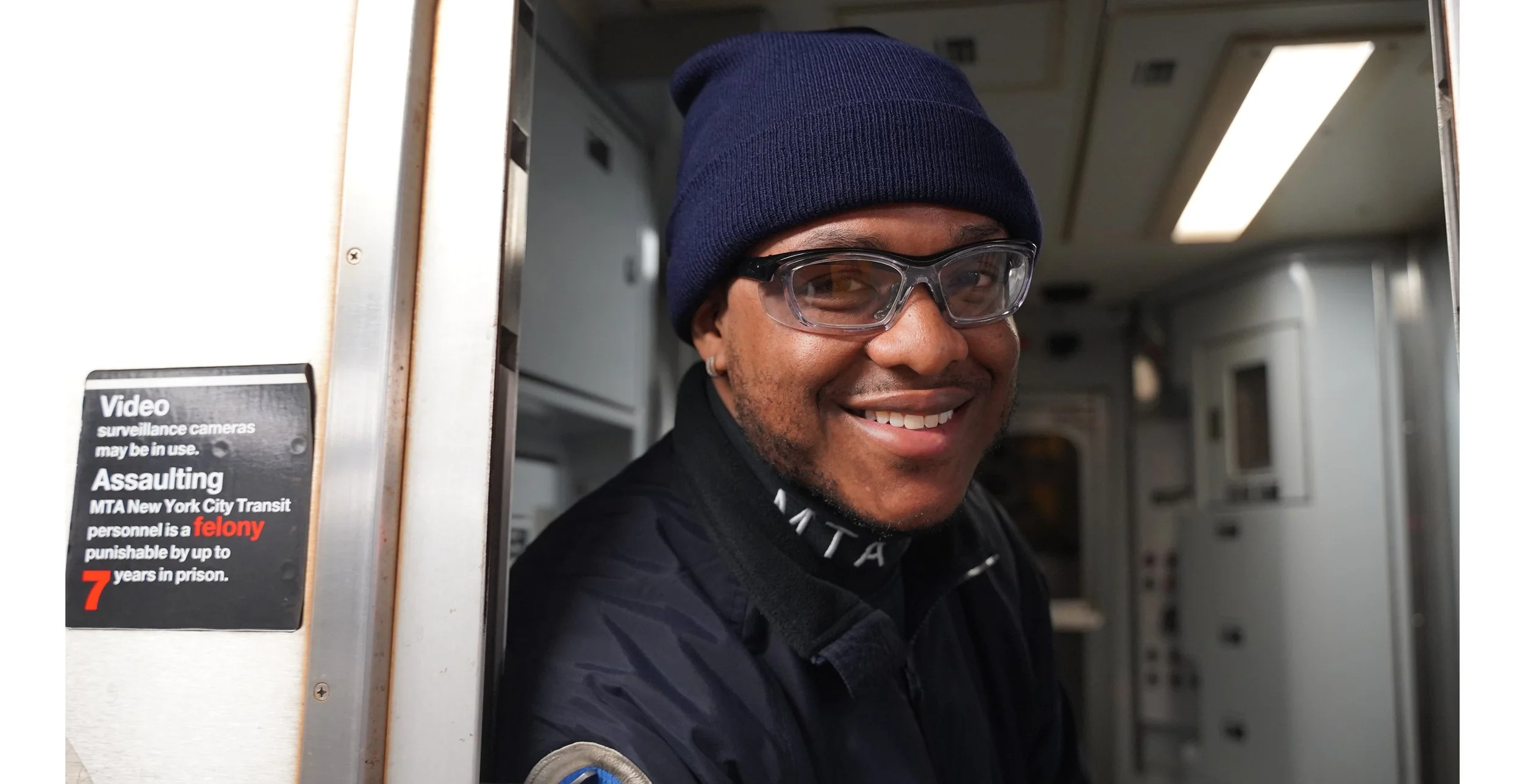 Emanuel is used to leaning out of the cars to answer questions, and will hold the entire train to do so... but he don't often get asked to strike a pose! Emanuel, you are awesome. Thank you!