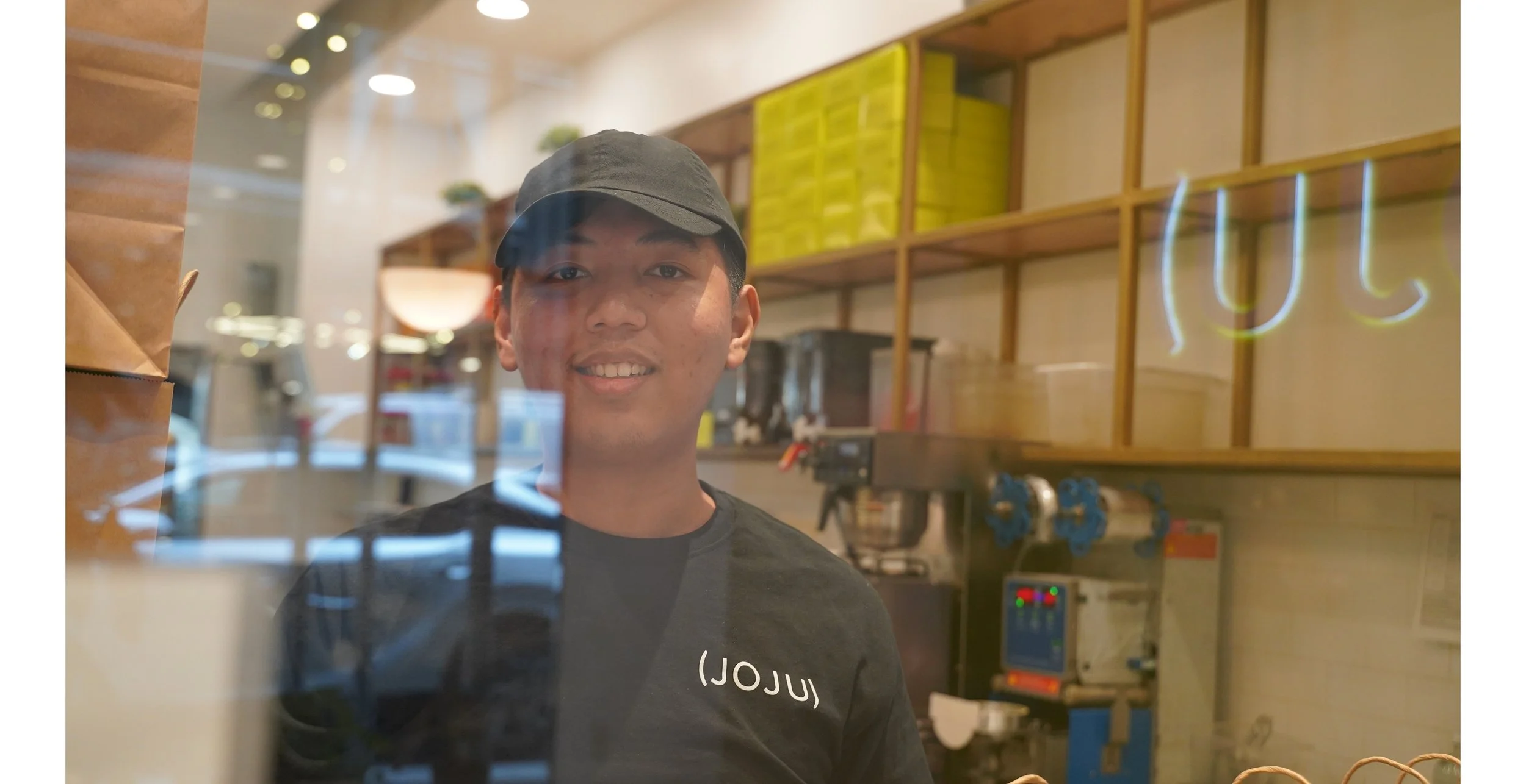 Kaung’s idea was to get down and peep through the little window, but I liked the reflection through the glass. I should have done both! I got the salmon bowl.