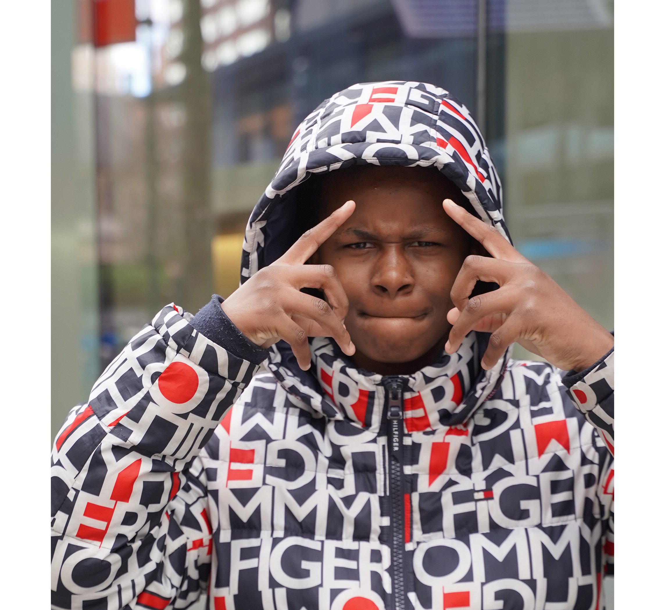 This young man was so excited by my message that he makes New York awesome! He pressed me to take his pocket money as a gift and pretended to take my picture too.