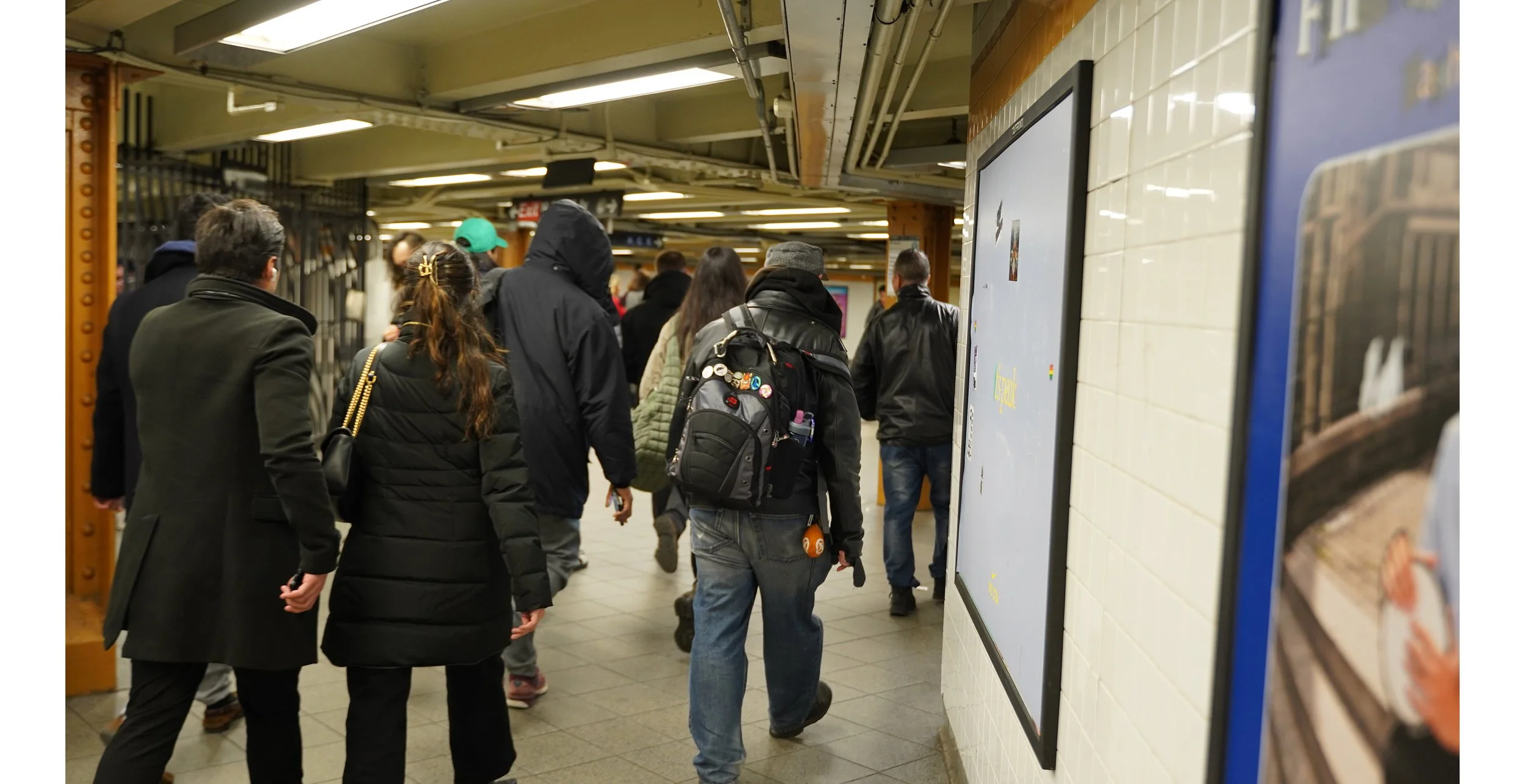 Heading home in the tunnel from the L to the A after checking out children's books at the Strand