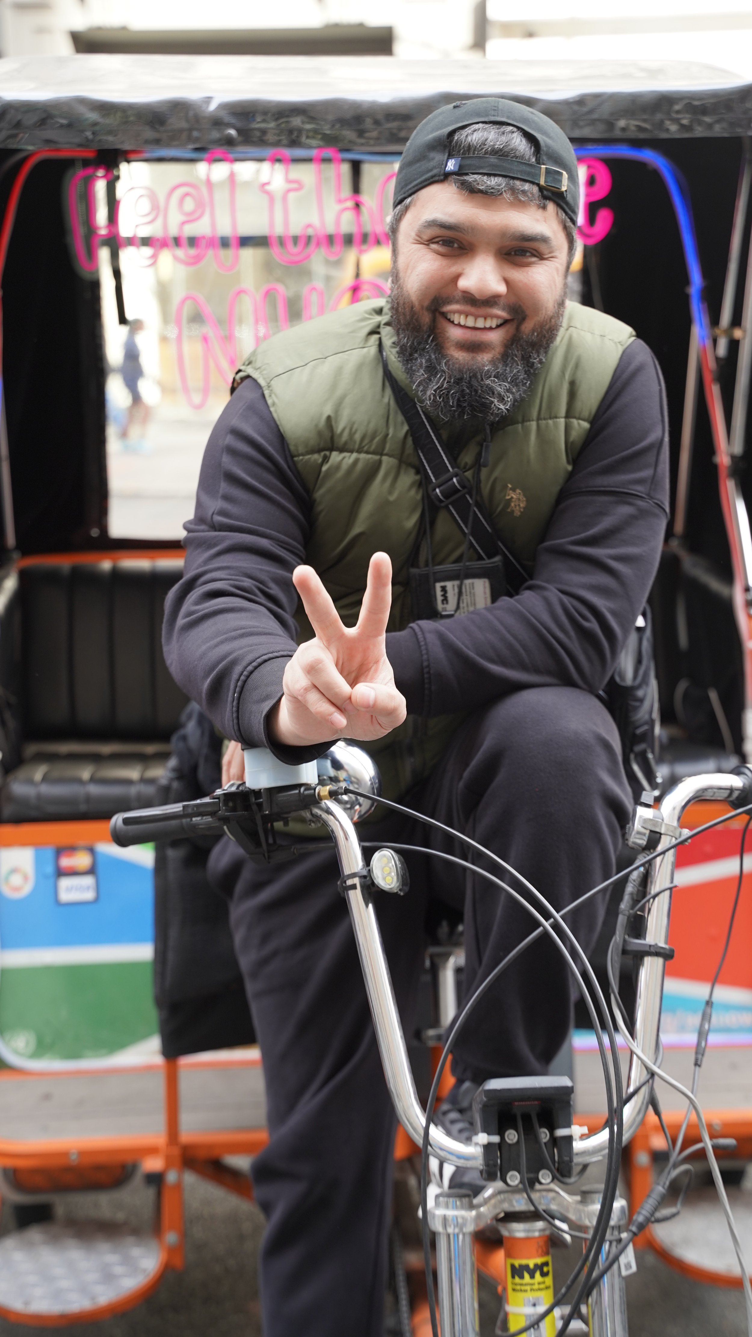 Rickshaw- 34th and 5th- Peace Sign SALMAN.JPG