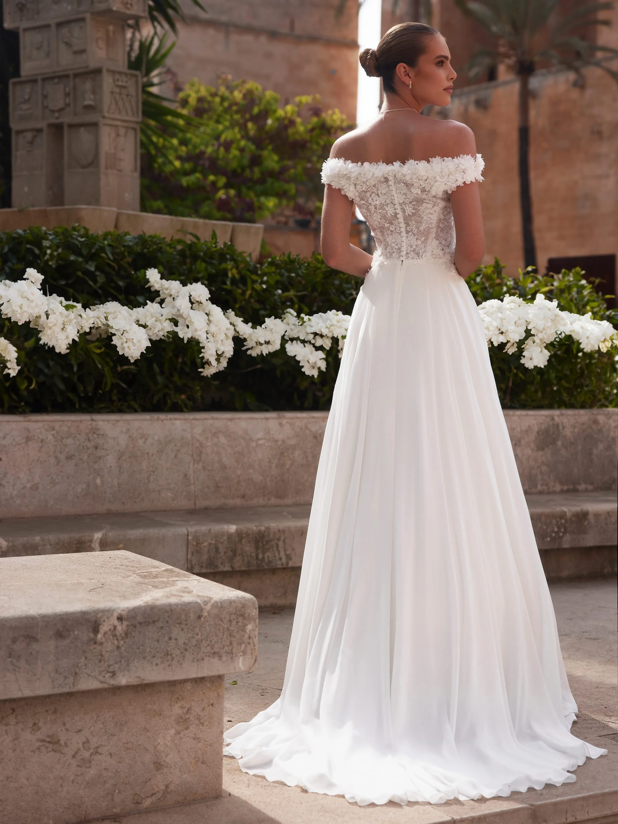 Milagros — back view