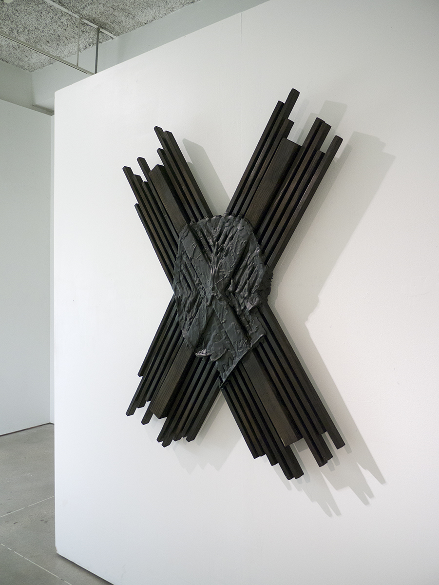 Portrait of a vandal, vandalized 2015 charred wood, resin, dye