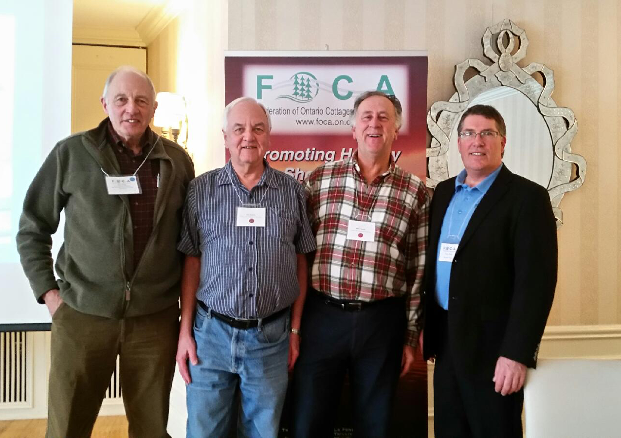 From left to right: Federation of Ontario Cottage Association (FOCA) President Ken Grant, PLCA Treasurer Allan McKellar, PLCA President Mike Thomas, and FOCA Executive Director Terry Rees, at the March 5thFOCA AGM in Toronto.