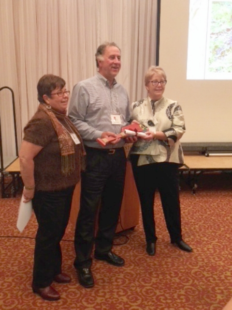 Haliburton Highlands Land Trust Chair Mary Lou Gerstl, PLCA President Mike Thomas, and board member Pat Warren at the 2016 HHLT gala.