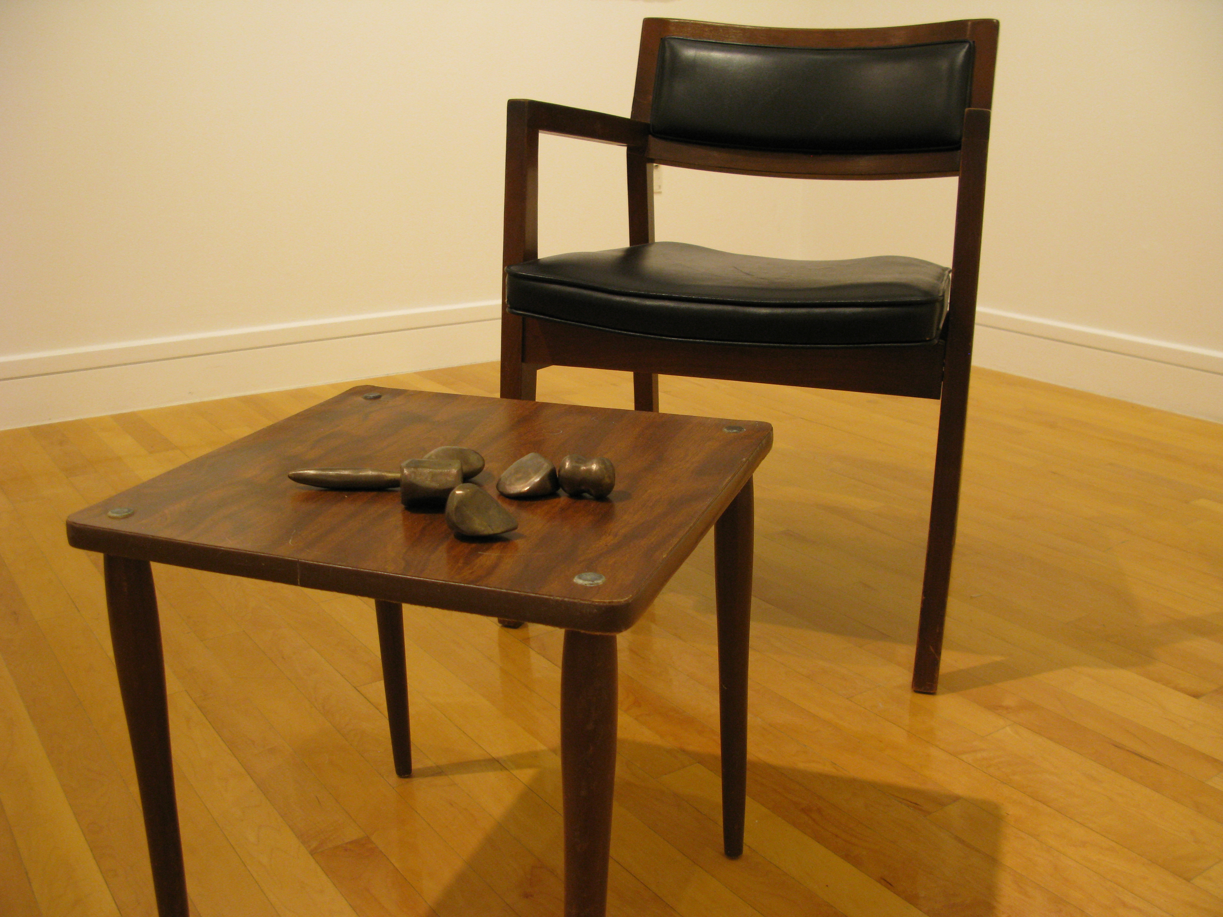  Hunter-Gatherer  found chair and table, solid bronze objects  2011  Approx. 20 x 30 x 40 in. 