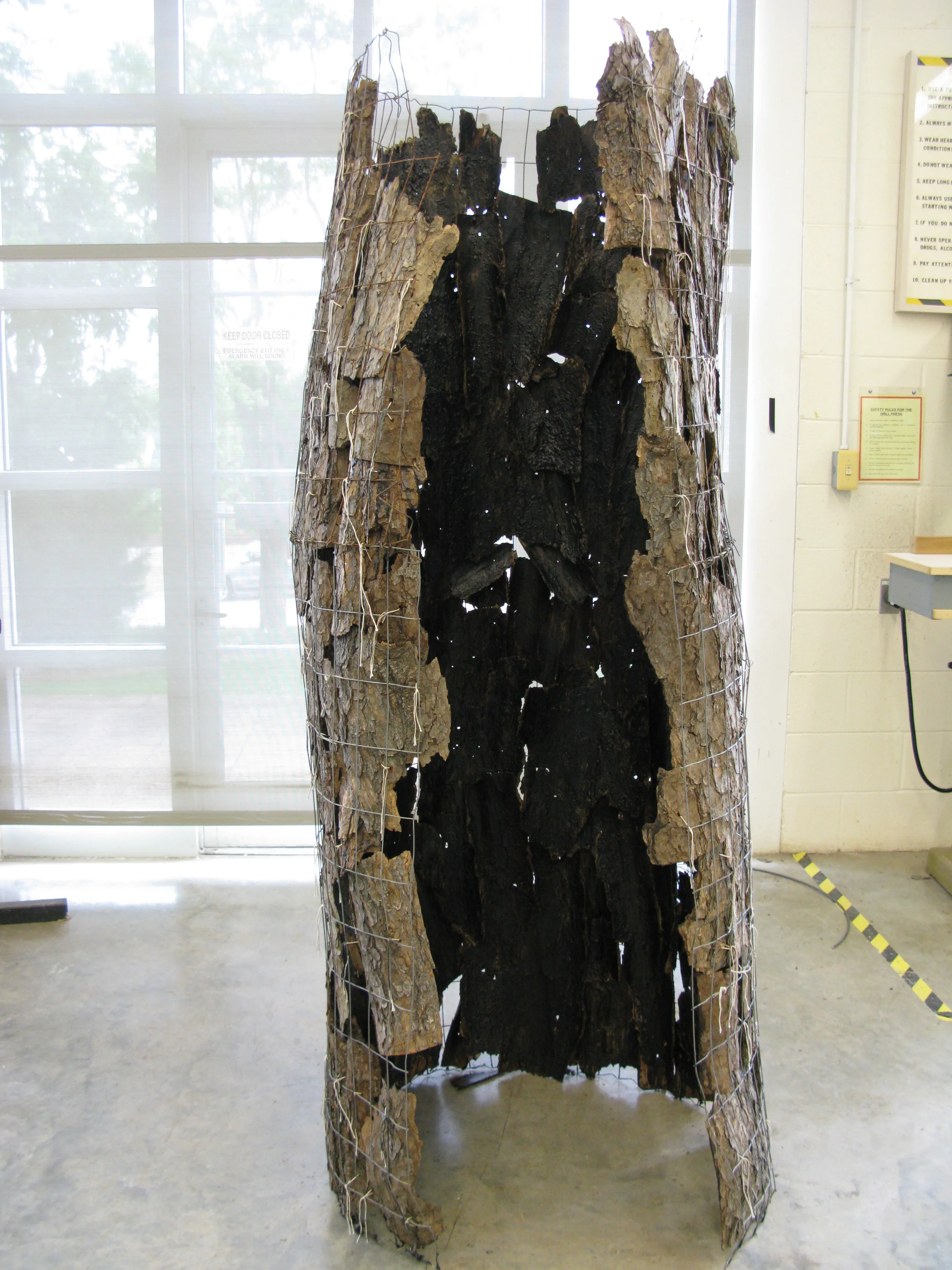 Untitled pine bark, beeswax, char, wire mesh frame, cotton twine 7ft. h. x 3ft. diam. 2012