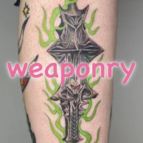 weaponry tattoos