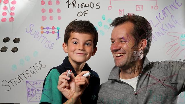 Harry Johnson, 7, and his dad, Philip, find maths fun. Picture: Alex Coppel Source: Herald Sun