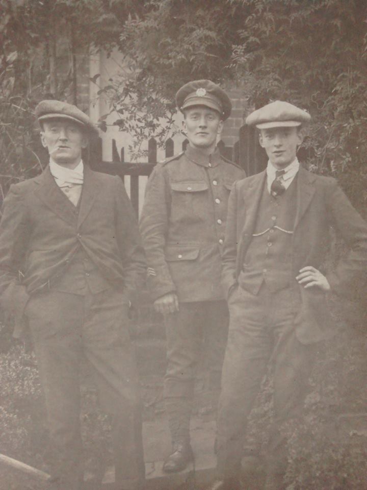 Charles Mitchell with his brothers outside their house on Angel Street