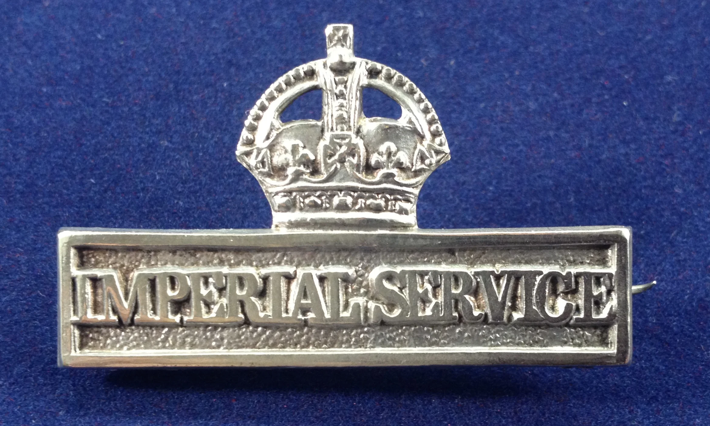 The badge as described in para 4 of the 'conditions of service' above