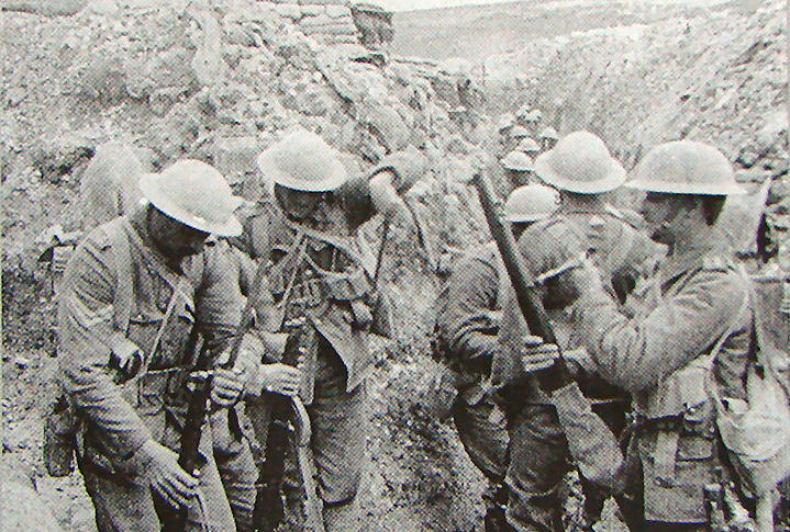 Soldier with a breach cover fitted to his rifle.