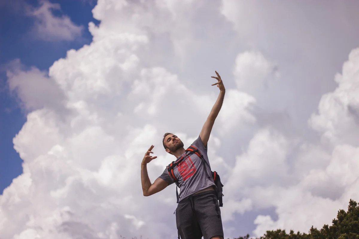 funny pose with clouds.jpg