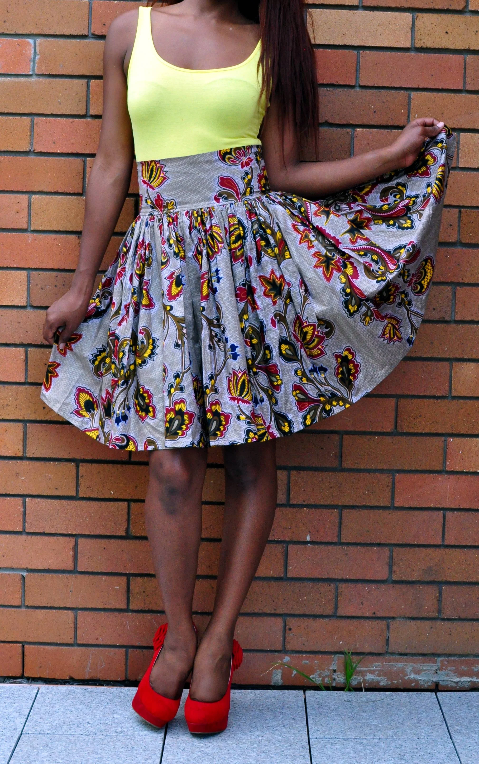 Kneelength High Waisted Pleated Skirt