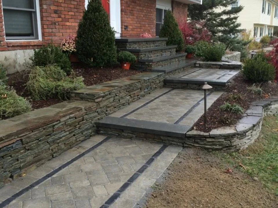 Walkway and outdoor lighting - landscaping ideas in Pine Island, New York