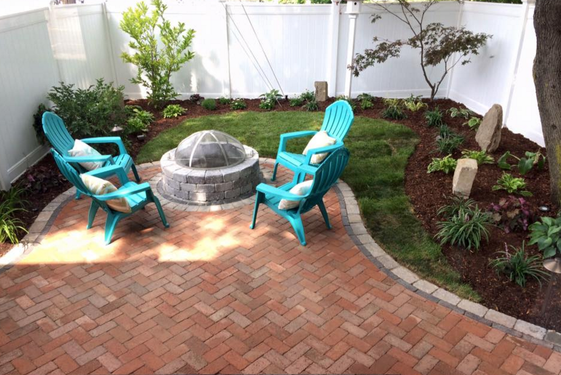 another picture of the after of the patio and fire pit