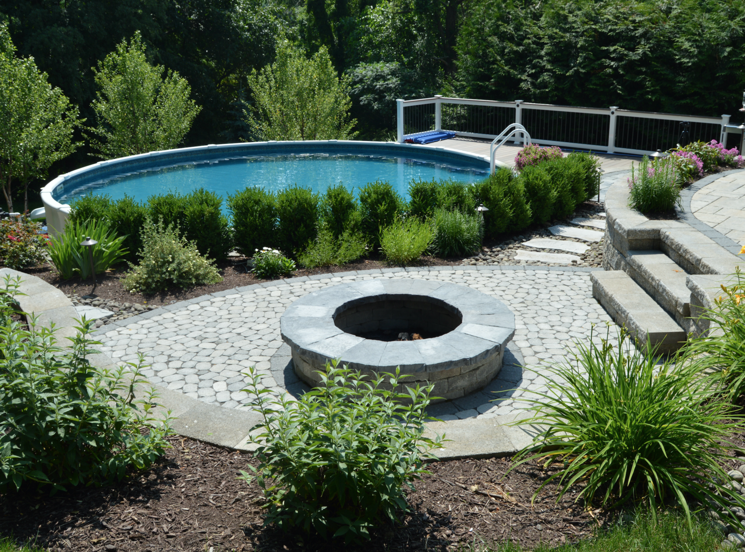 Poolside Fire Pit And Patio In Florida, Goshen Stone Fire Pit
