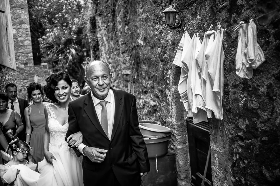 27_Destination_Wedding_in_Monemvasia_bride_father_great_smile.jpg
