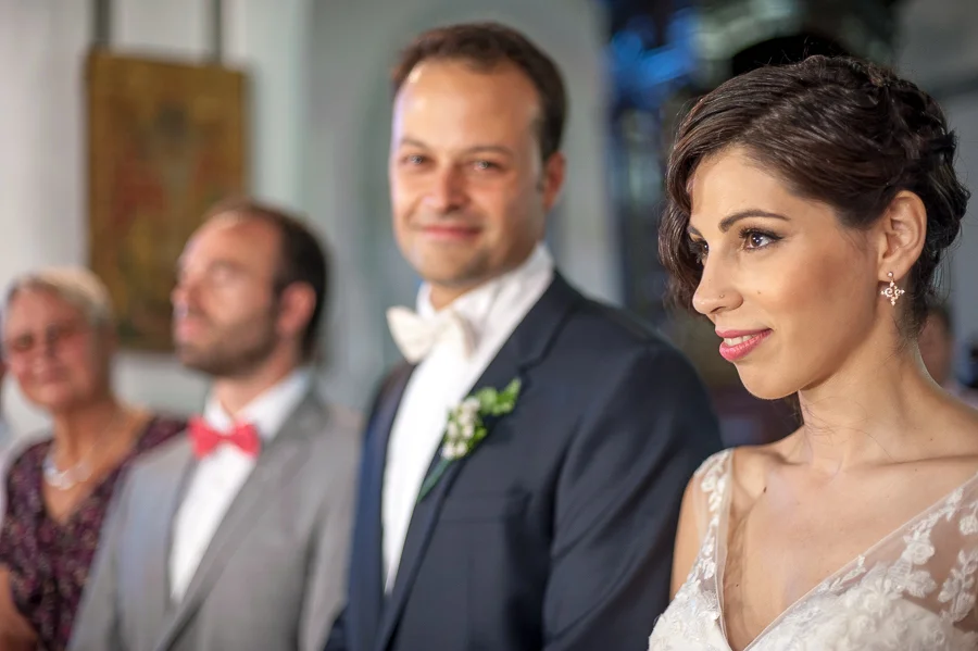 35_Destination_Wedding_in_Monemvasia_groom_smiling_bride.jpg