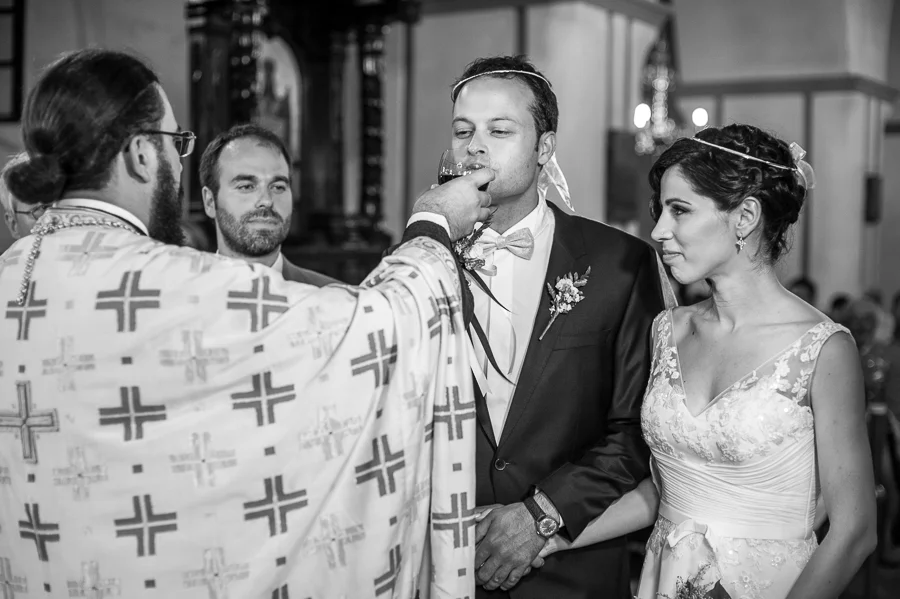 40_Destination_Wedding_in_Monemvasia_groom_wine.jpg