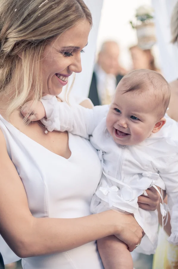 54_Baptism_In_Athens_Koropi_happy_baby.jpg