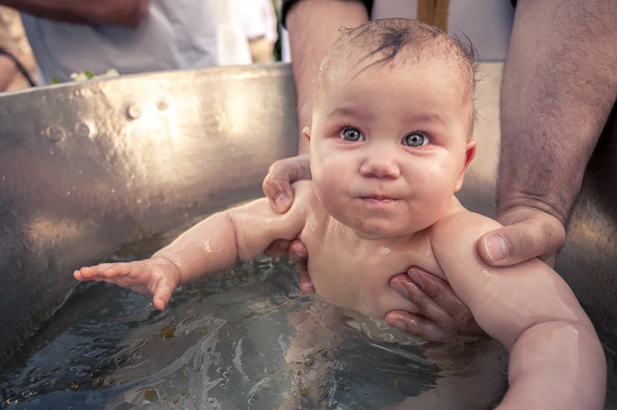 58_Baptism_In_Athens_Koropi_baby_smiling.jpg