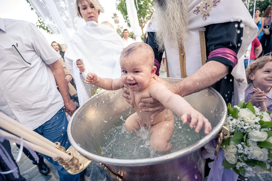 60_Baptism_In_Athens_Koropi_smiling_baby.jpg
