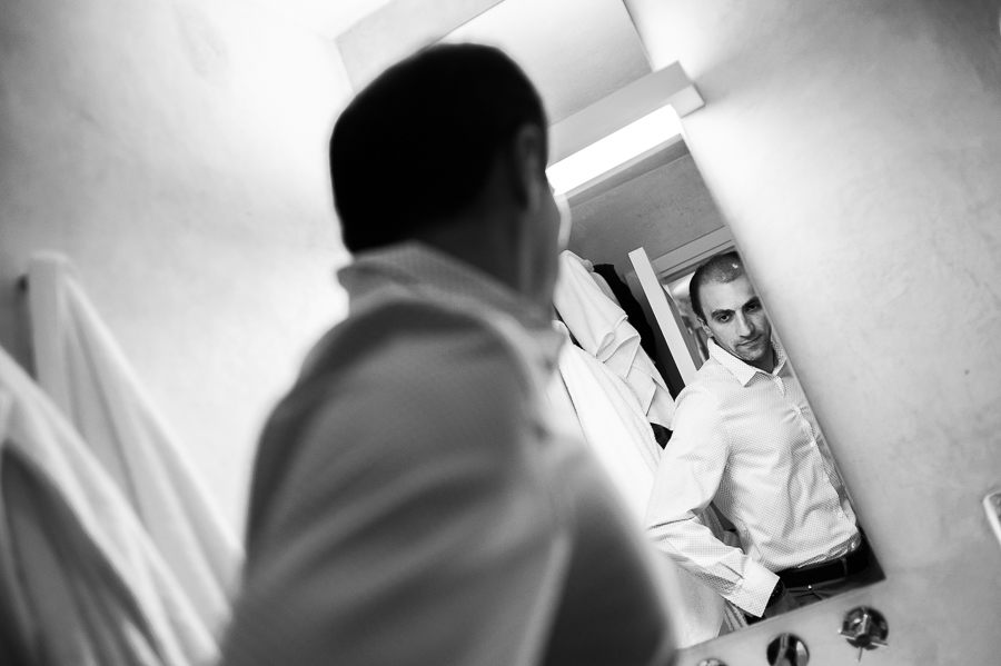 39_Wedding in Folegandros groom mirror.jpg