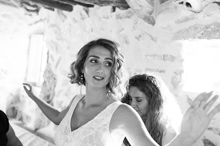 65_Wedding in Folegandros bride put dress.jpg