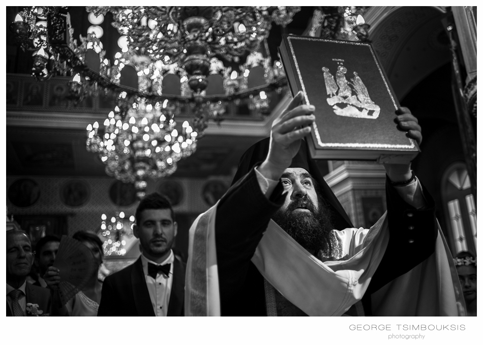 113_Wedding in Chios priest in light.jpg