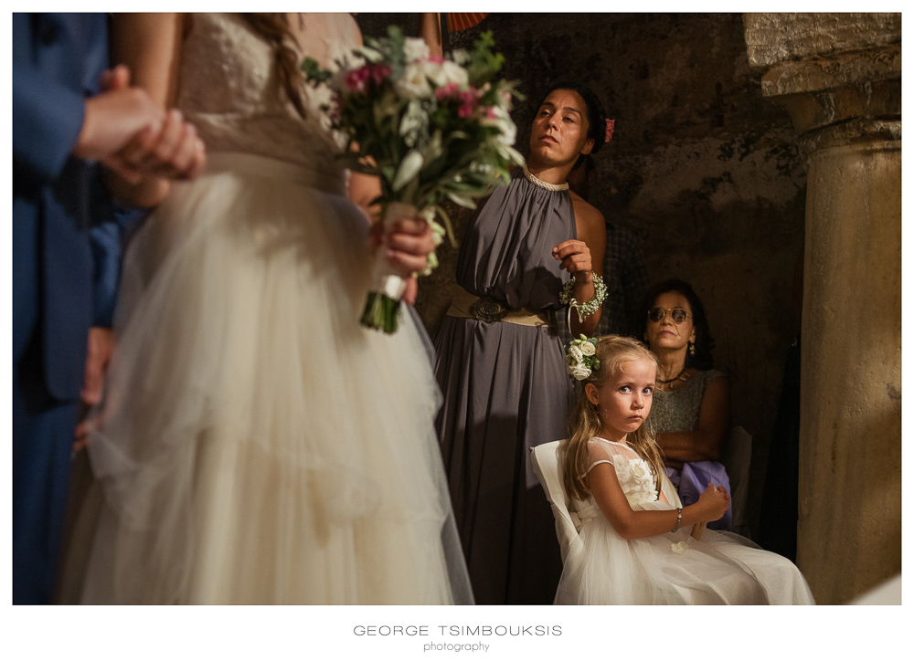 132_Wedding in Mystras_church kid portrait.jpg