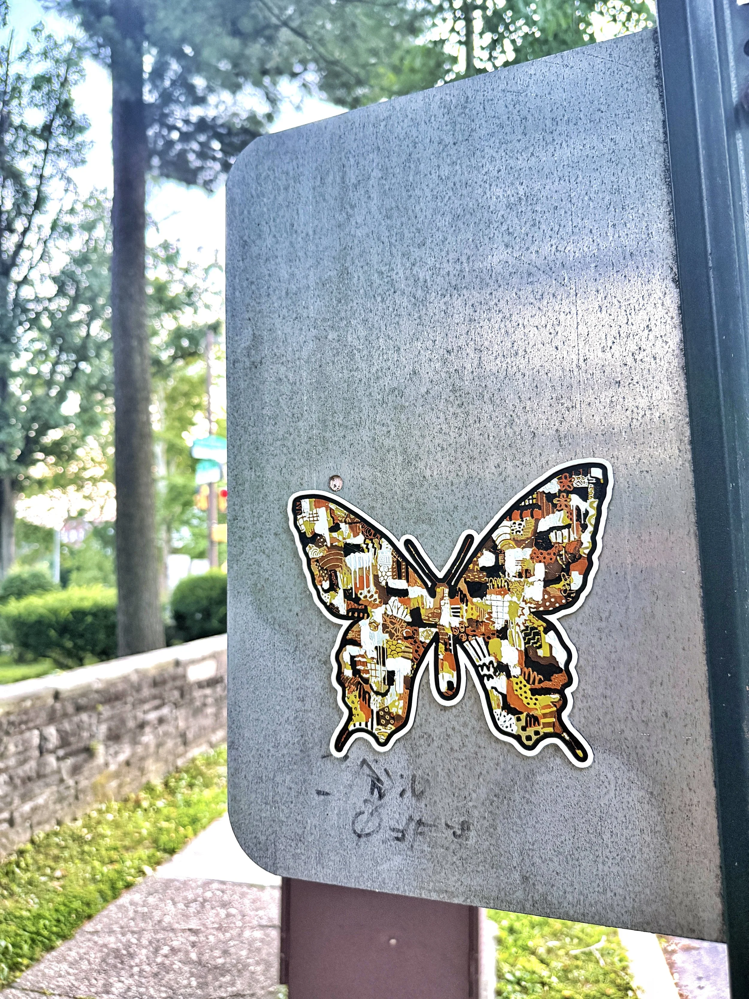 Cultures By Dezign -Tan-Toned Butterfly in West Philly (3-D Printed Street Art)