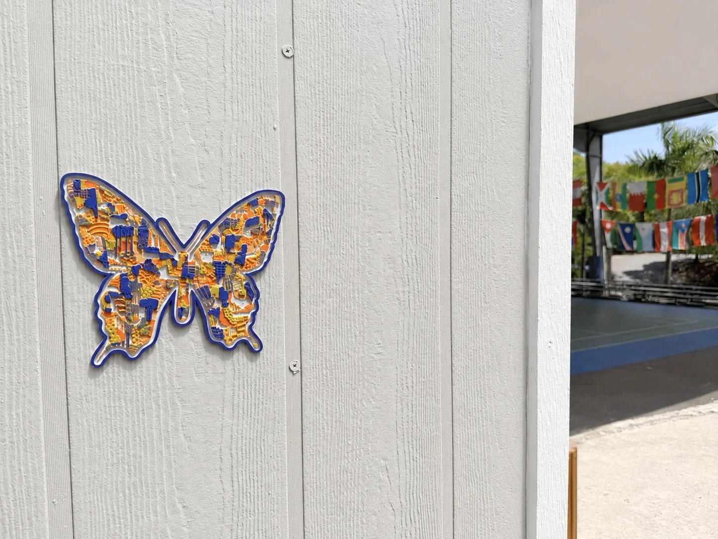 Cultures By Dezign - Orange & Blue Butterfly at Vimsia in St Thomas (3-D Printed Street Art)