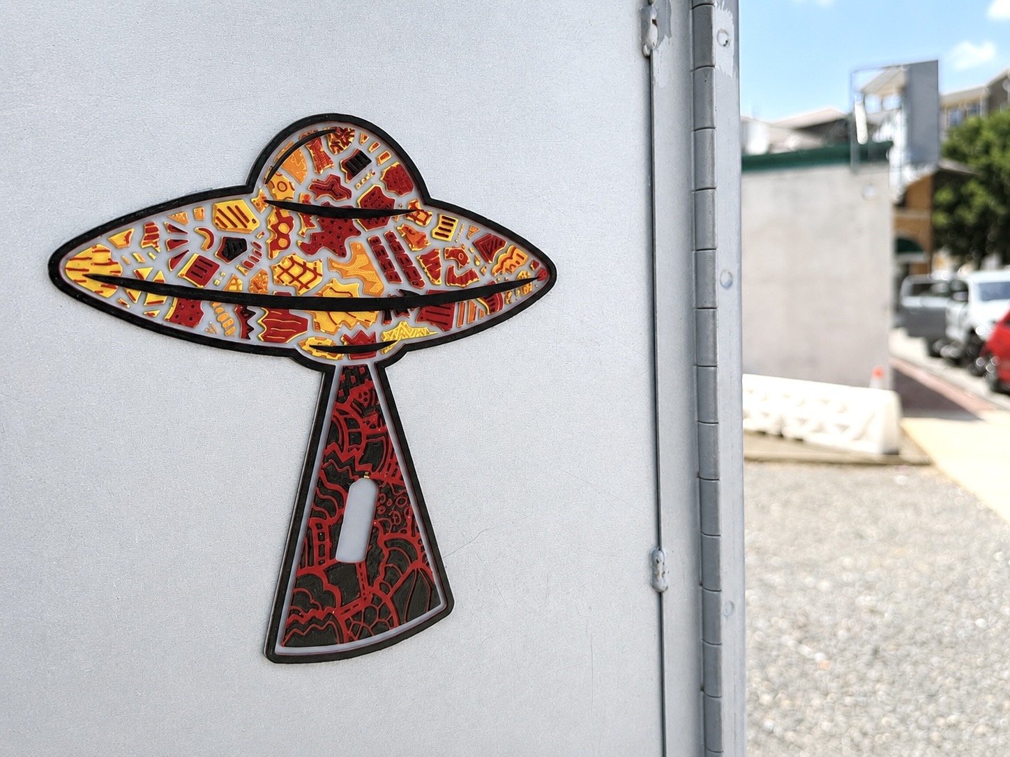 Cultures By Dezign - Orange, Black & Red UFO in West Philly (3-D Printed Street Art)