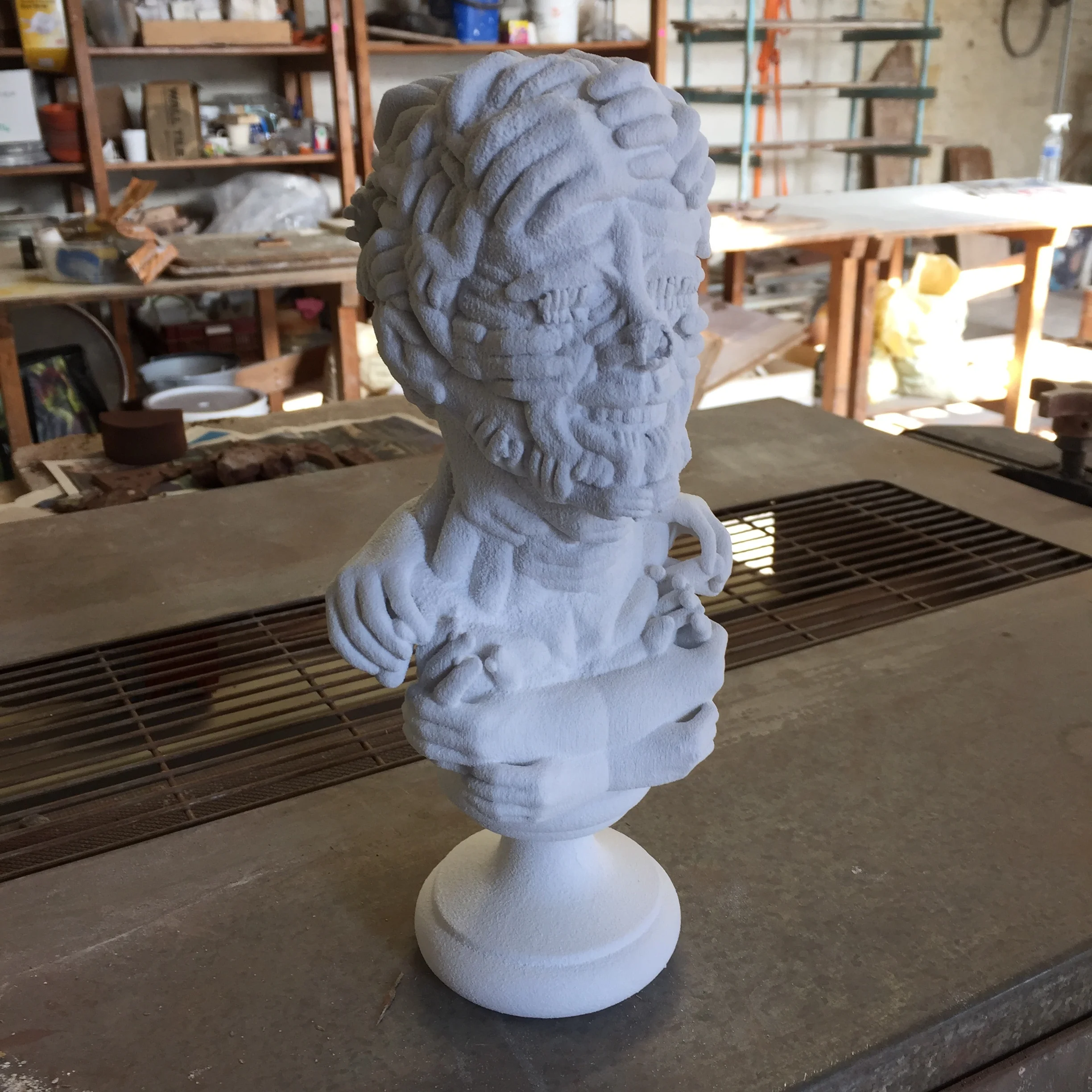 A bust by John Rainey, awaiting biscuit firing.