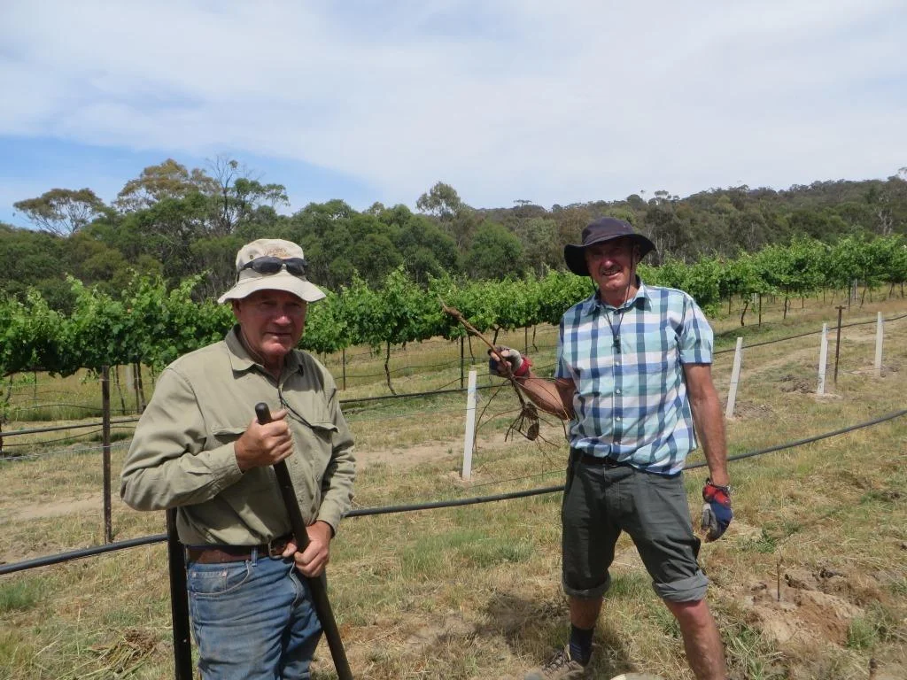 Les, our Winemaker to the left and Dr. Robertson, to the right.