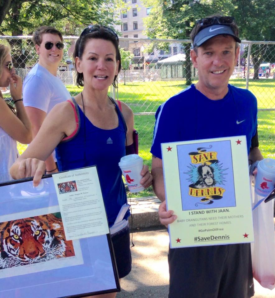 Two awesome donors showing their support for little baby orangutan Dennis + their Tiger print from DougJenThomas Art! Source: BPOAT