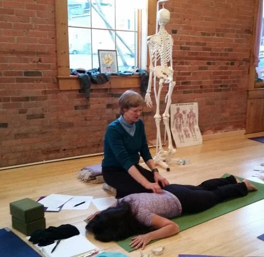 Ellen demonstrating spine.jpg