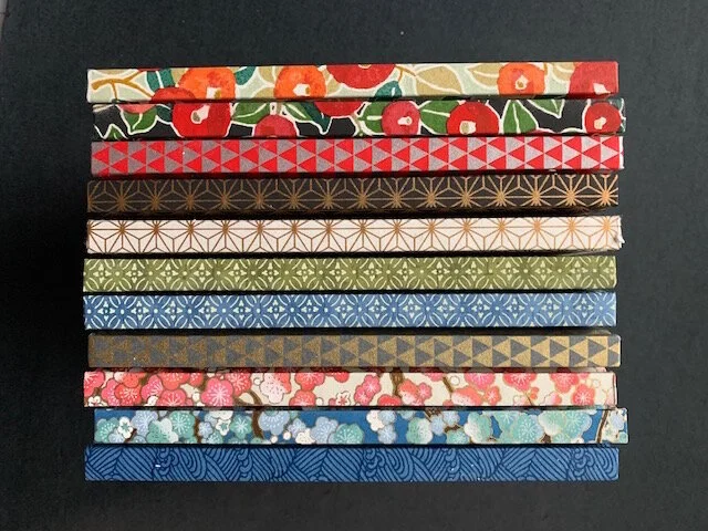 Stack of Chiyogami Journals.JPG