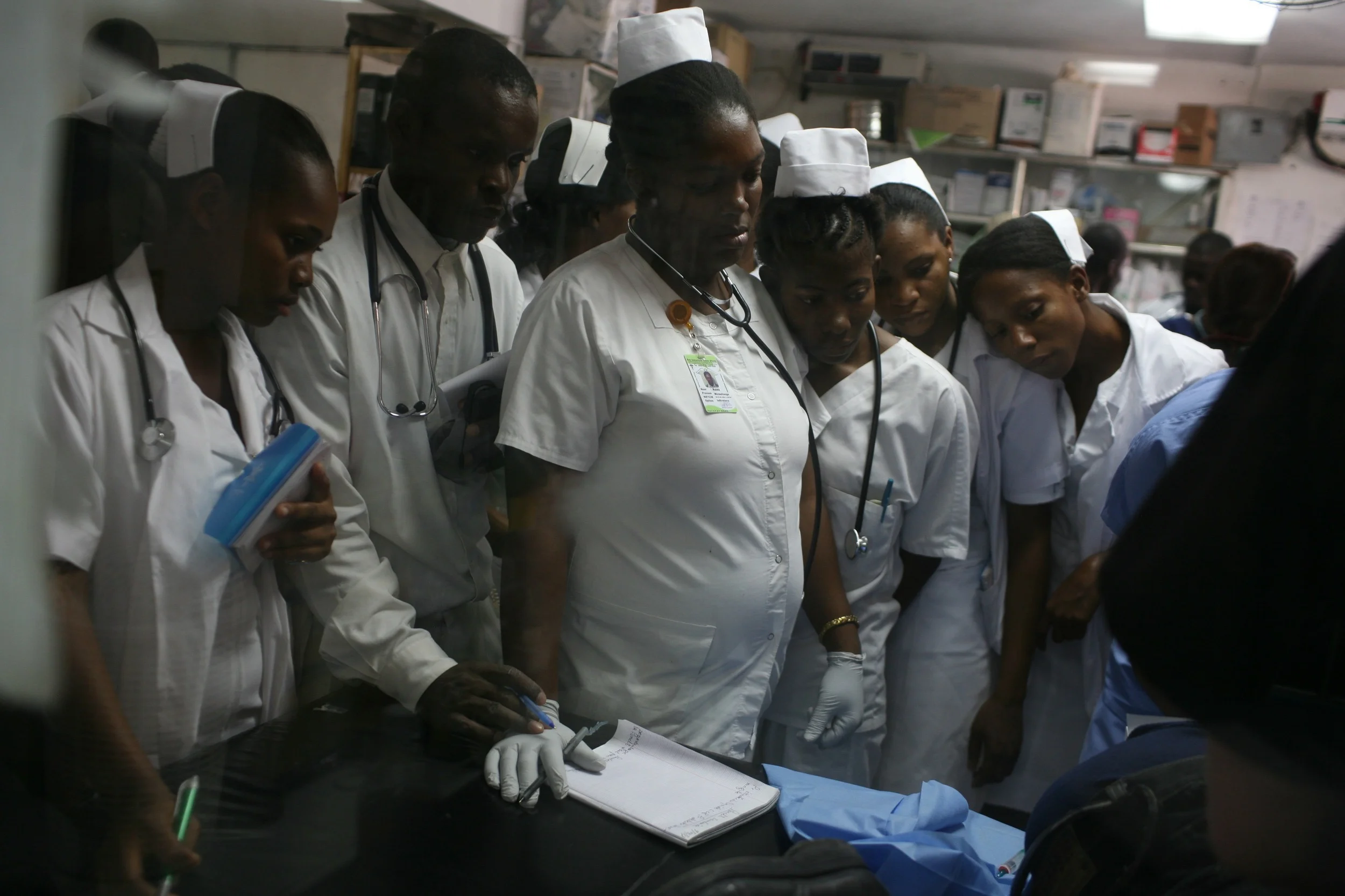  Haitian students eagerly wanting to learn from the new technology