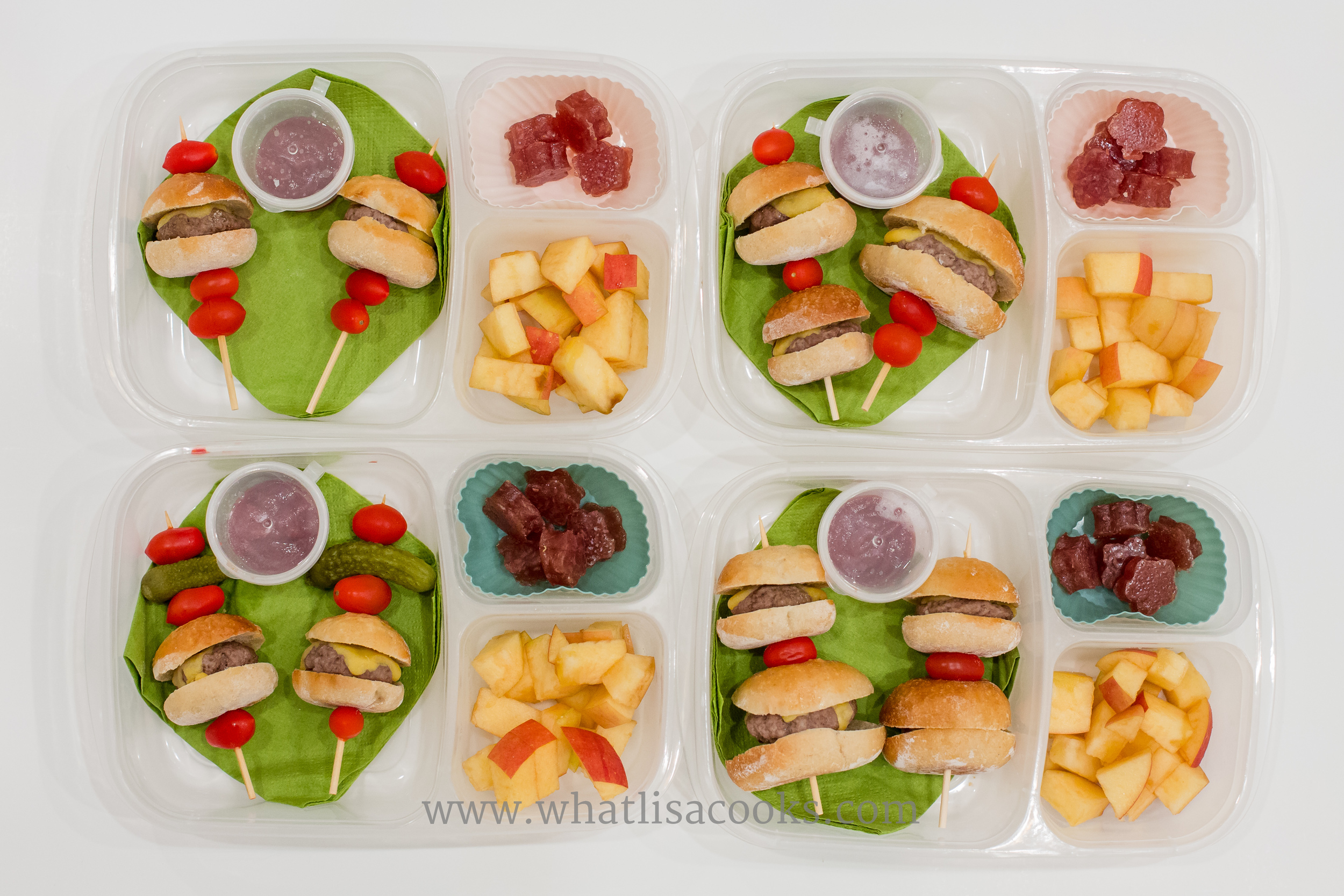 Tiny hamburgers on skewers! Oven roasted burgers with cheddar cheese on homemade buns, with tomatoes, ketchup for dipping, apples and pears, orange raspberry gummies. 