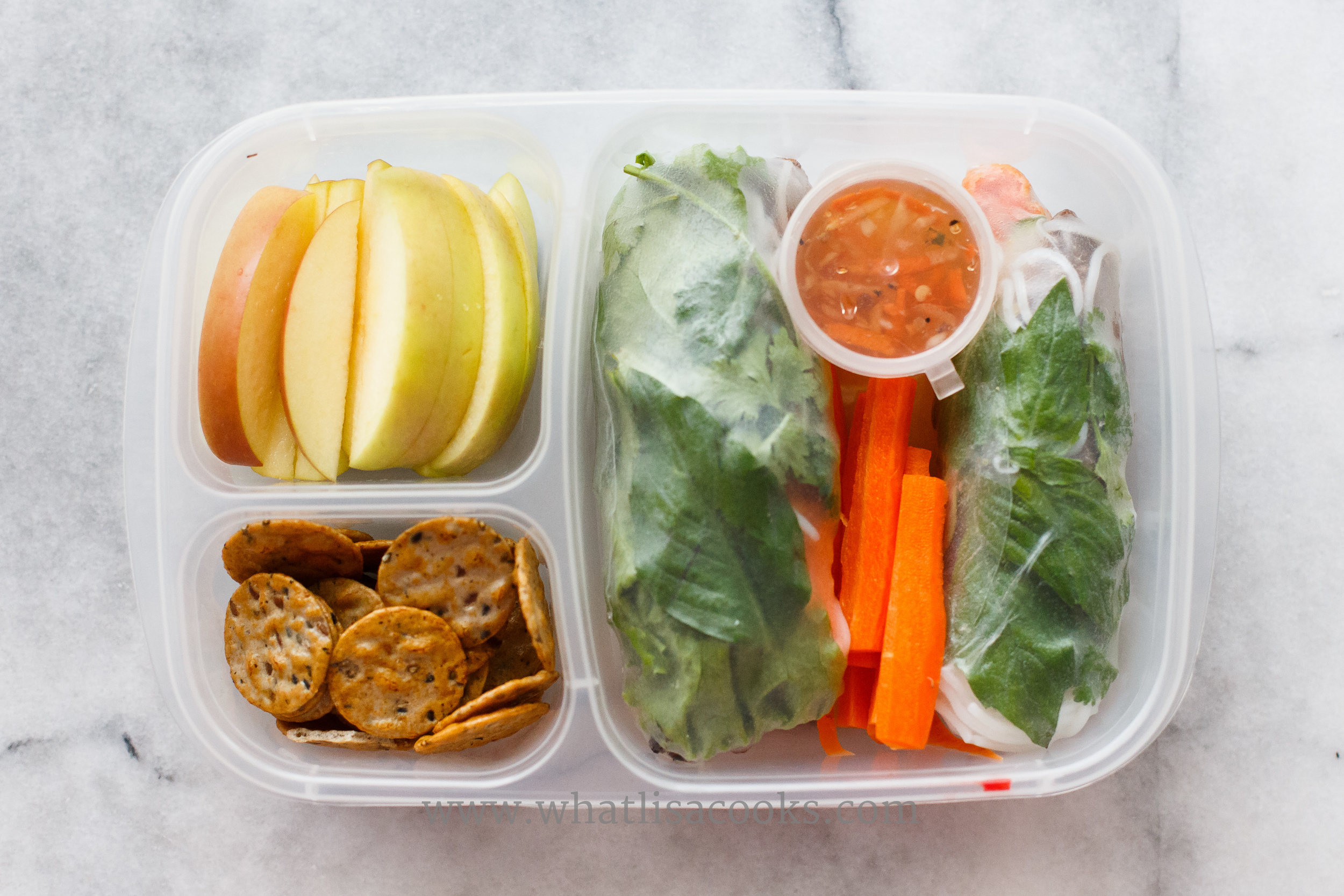 Summer roll wraps made with leftovers from a Vietnamese dinner out, with some carrots, apples, and rice crackers. 