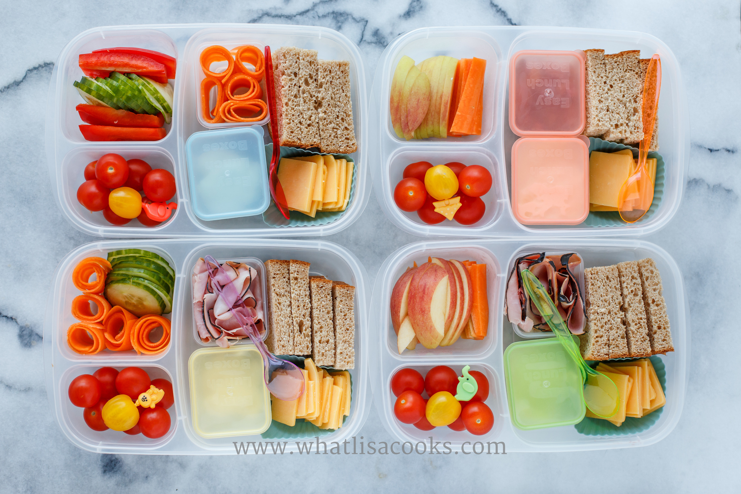 I think this might have been one of my favorite lunches so far. It was just so pretty. And this has quickly become one of my kid's favorite lunches: make your own sandwich. Honey whole wheat bread, cheese, various combinations of ham, cucumber, carrot, peppers, apples, depending on what each child likes. Mayo for three of them, a side of yogurt for the fourth. And they all have some cherry tomatoes. 