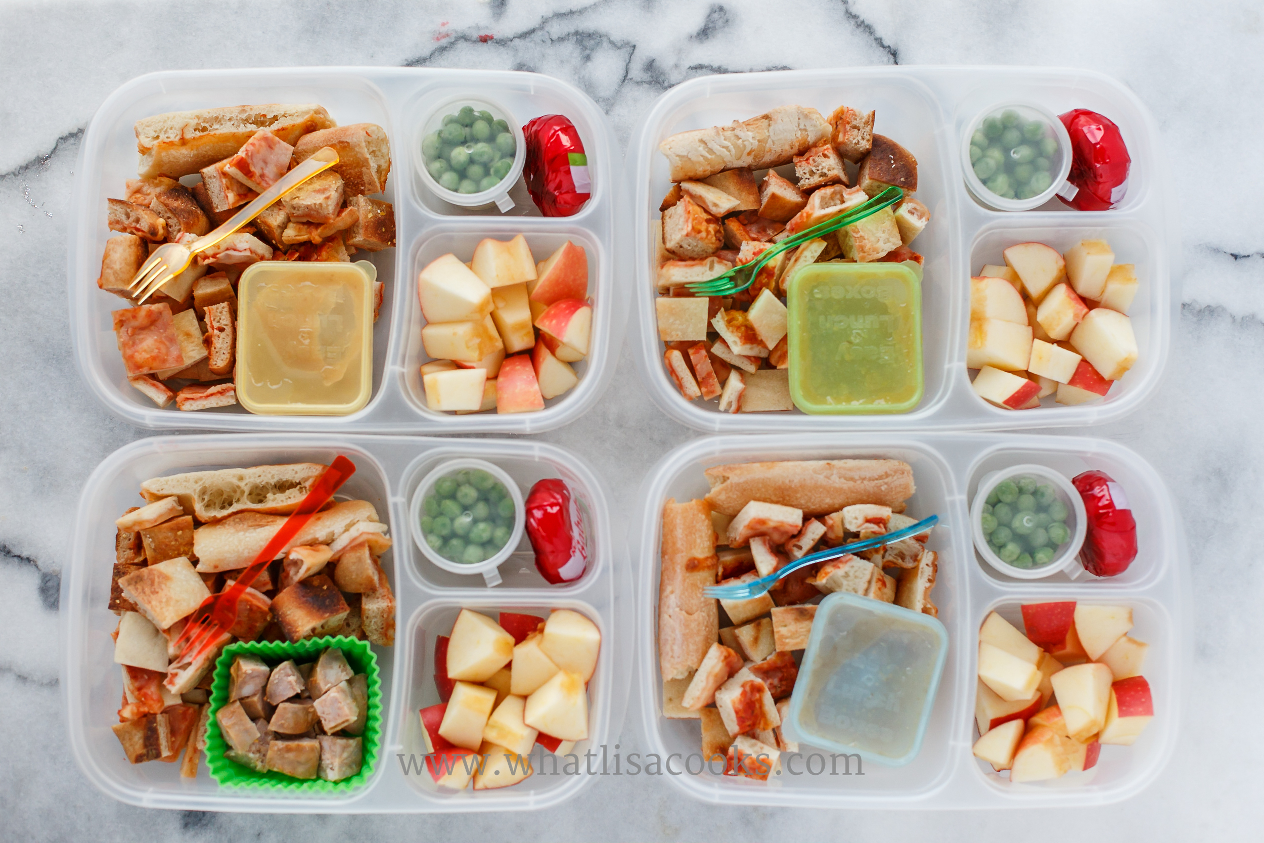 Bites of leftover pizza, peas, cheese, apples, and three have applesauce while one has sausage. 